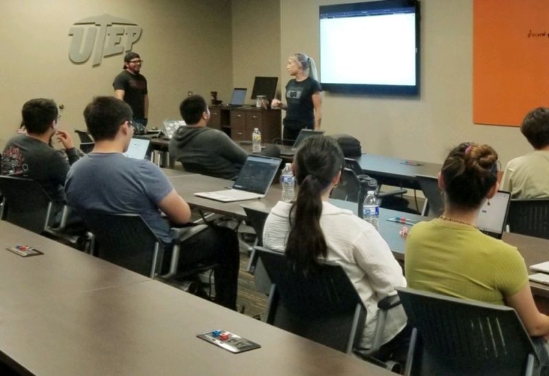 Students attending a local WiCyS cybersecurity workshop